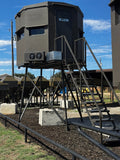 All Seasons Feeders 8×8 Ultimate Mas Chingon hunting blind on eight-foot tower with AC unit and stairs