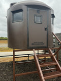 Tank Blind #5 enclosed elevated hunting blind with four-foot skid, steel steps and gun windows
